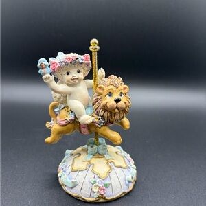 Whimsical 2000's Cherub and Lion Carousel Figurine